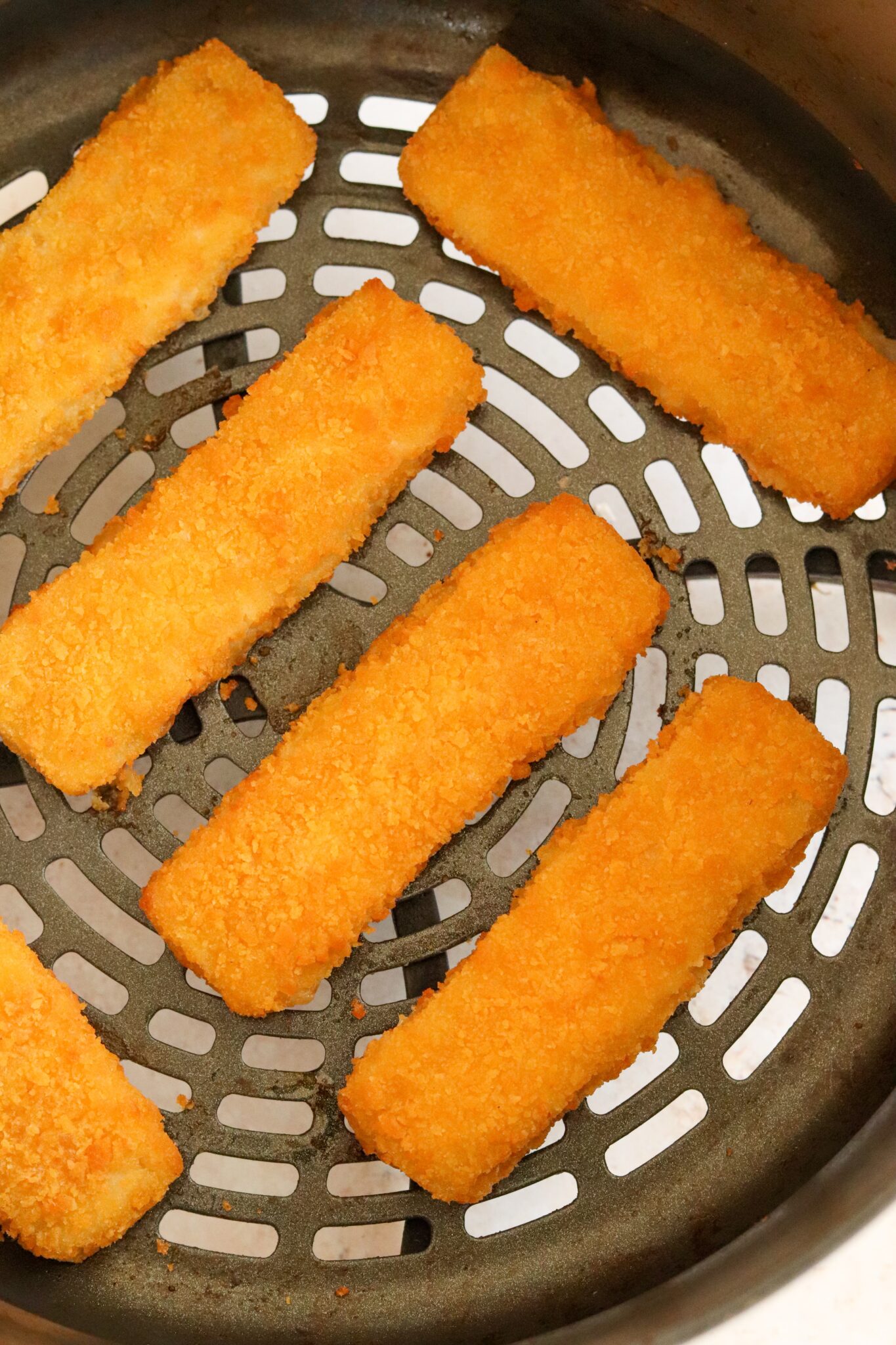 Should I Use an Air Fryer Liner? Everything You Need To Know Curly's