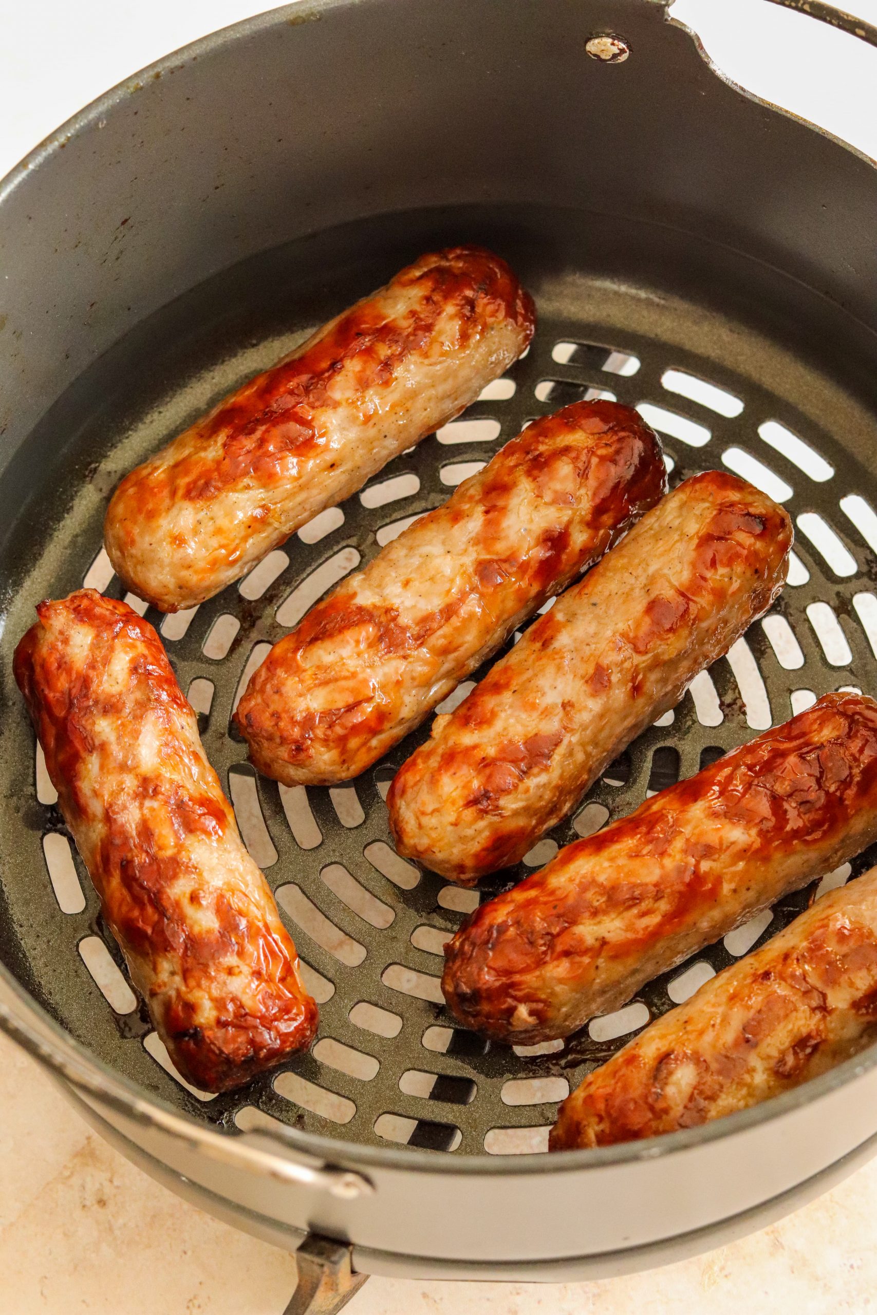 sausages in air fryer basket