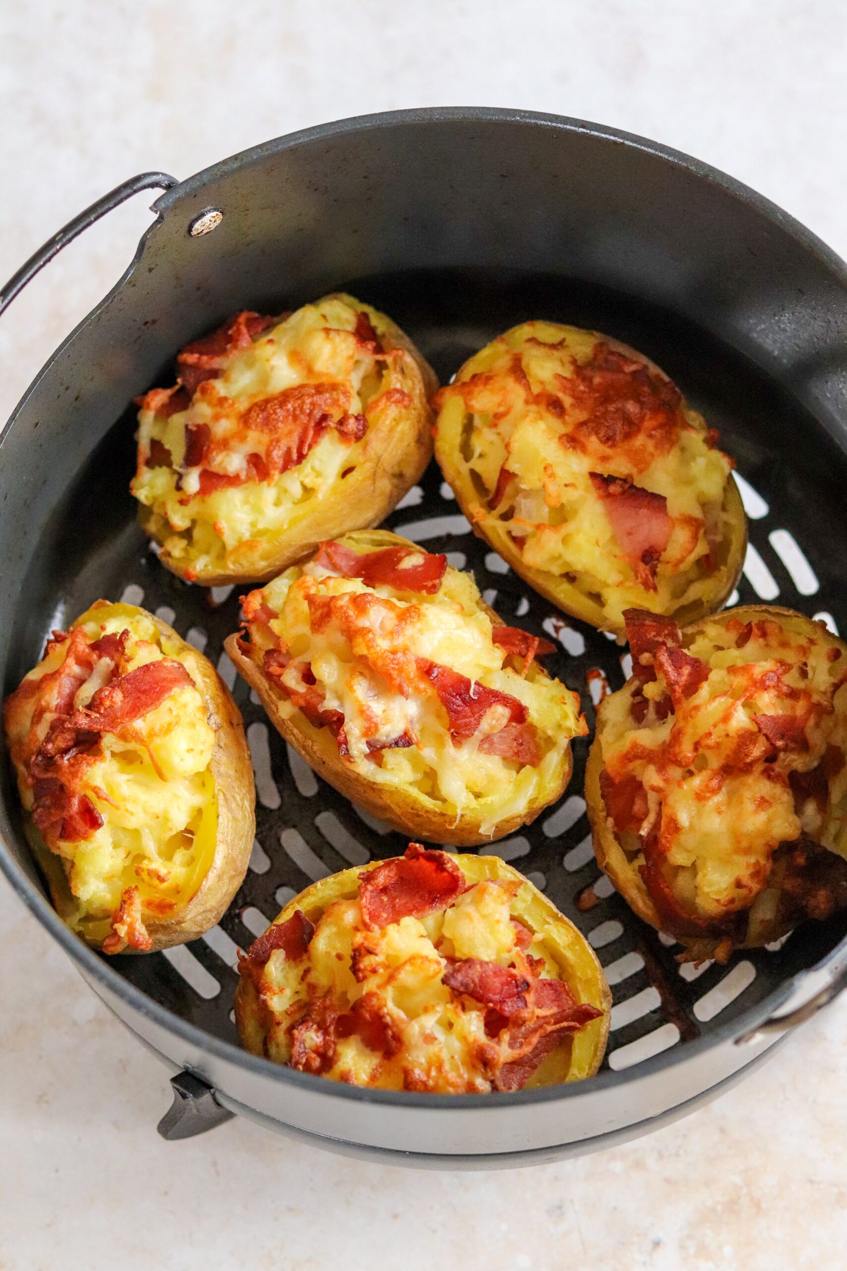 https://www.curlyscooking.co.uk/wp-content/uploads/2023/02/Air-Fryer-Loaded-Potato-Skins-1-scaled.jpg